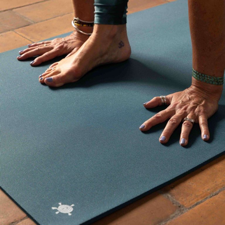 Yogini practicing on a KURMA CORE 2 meter long yoga mat