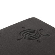 kurma yoga foam brick black zoomed-in on logo