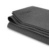 KURMA Fold-N-Flow travel yoga mat in anthracite with embossed logo