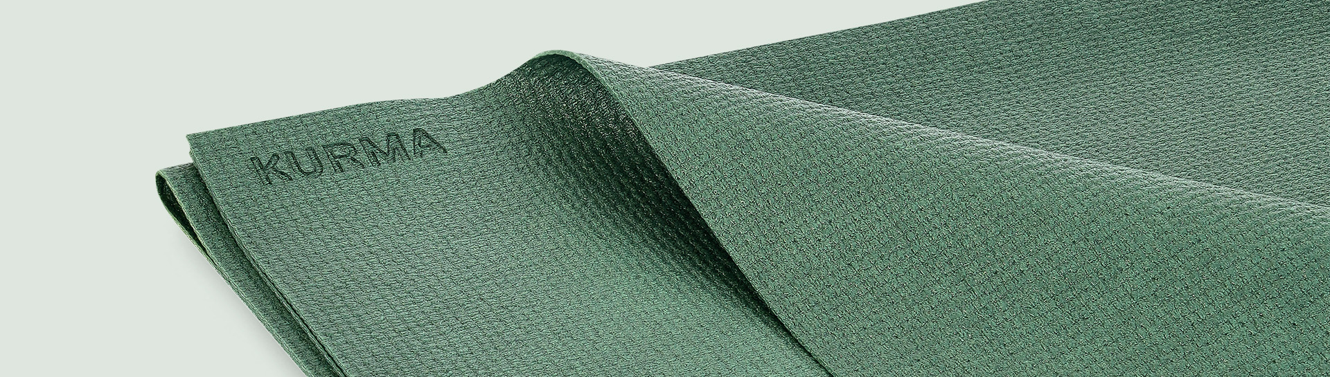 Kurma_Fold-N-Flow_Moss_folded mat_ready to go on a journey